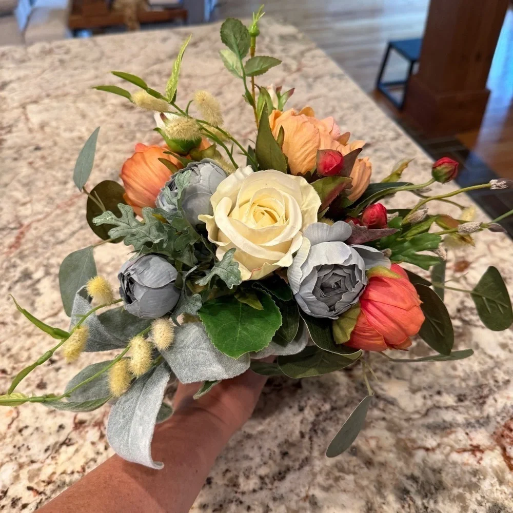 Floral bridal bouquet Arrangement Cream, blue Orange Accents wedding flowers